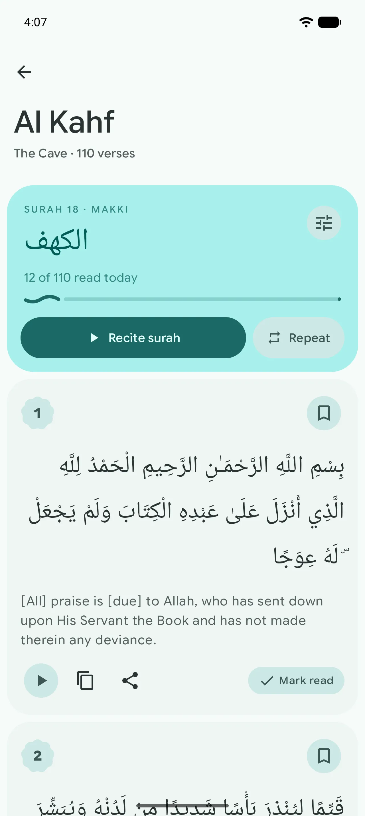 The One Ummah Quran reader open at Surah Al Kahf